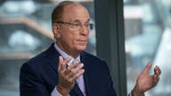 Larry Fink says Fed won't cut interest rates as much as people think, warns inflation 'embedded'