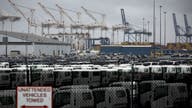 Dockworkers' union reaches tentative agreement, will suspend port strike until January