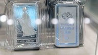 Silver surpasses $50 an ounce for first time amid geopolitical, economic uncertainty