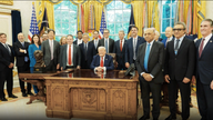 Behind the scenes: Tech titans meet Trump, Apple's Cook praises pro-business policies